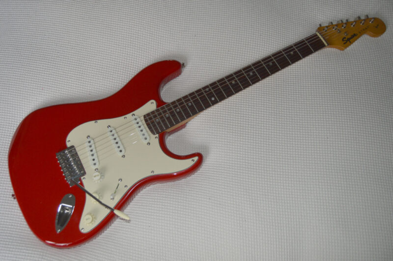 Red 1995 Squier Strat